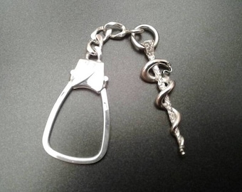 Llavero de Esculapio de plata de ley