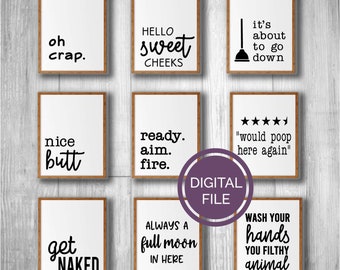 May include: Nine framed bathroom art prints with humorous phrases in black font on white backgrounds. Phrases include "oh crap," "hello sweet cheeks," and "wash your hands you filthy animal." A digital file is also advertised.