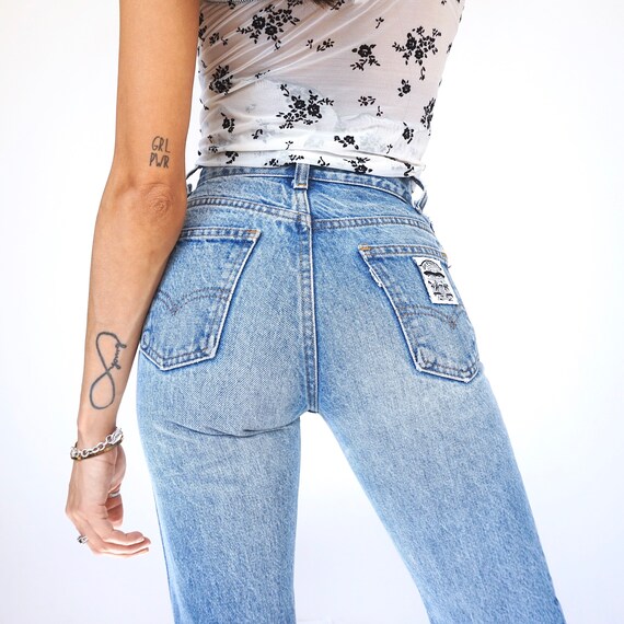 Vintage White Patch Levi’s Jeans 22/23