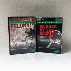 May include: Two vintage computer game boxes for Apple IIe. The first box is black with a red title "FELONY!" and a newspaper clipping image. The second box is black with a red title "MURDER BY THE DOZEN" and a magnifying glass image. Both boxes have the CBS Software logo.