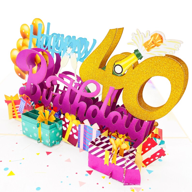 May include: A 3D pop-up birthday card with a gold glitter "40" and the words "Happy Birthday" in pink glitter. The card features a champagne bottle popping and a variety of colorful gift boxes.