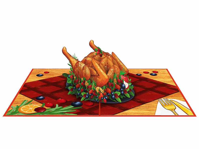May include: A 3D pop-up card featuring a roasted turkey with a cranberry and blueberry sauce, surrounded by rosemary sprigs and orange slices. The turkey is on a black plate and a red and white checkered tablecloth. A gold fork and knife are on a white napkin on a wooden table.