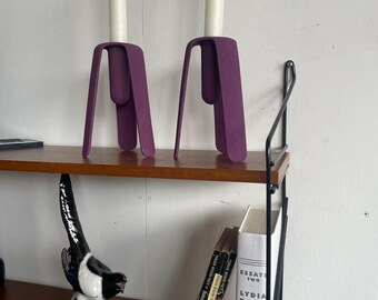 Pair of postmodern cast iron purple painted candle holders