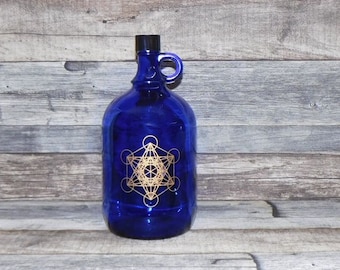 Blauwe glazen fles van 2 liter met handvat en Metatron-goud.