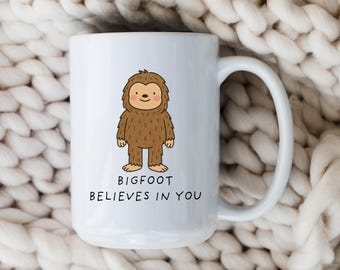 Funny Bigfoot Mug • Cartoon Sasquatch Coffee Cup • Bigfoot Gift for Him • Cute Bigfoot Illustration • Bigfoot Believes In You
