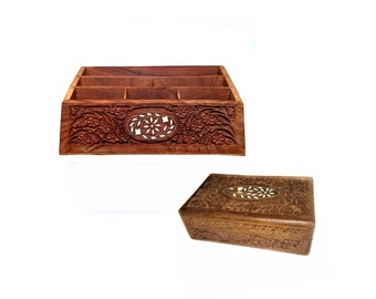 May include: A rectangular wooden box with a hinged lid and a matching open organizer tray. Both pieces feature intricate floral carvings and a central oval inlay made of white material, showcasing a natural brown wood grain finish throughout.