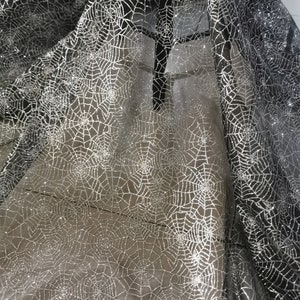 Silver Glitter Spider Web Fabric: Halloween Mesh, 58" Wide