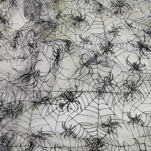 Black spider flocking on tull mesh spider fabric Halloween fabric by the yard