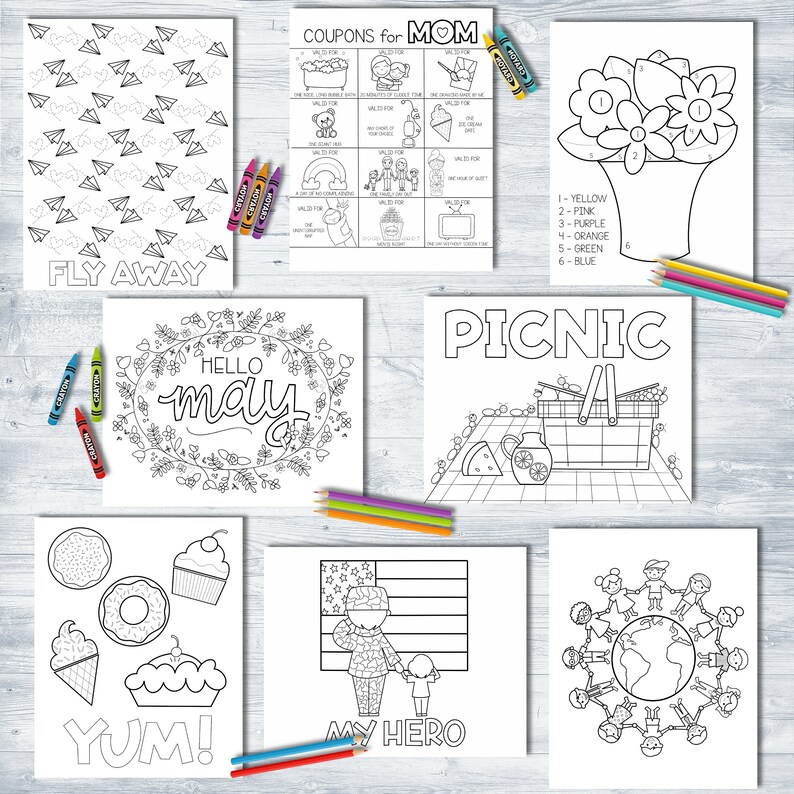Puede incluir: Una colecci&oacute;n de p&aacute;ginas para colorear en blanco y negro con varios temas, incluyendo aviones de papel, flores, cupones para mam&aacute;, una escena de picnic, postres, una bandera americana y ni&ntilde;os de todo el mundo. Los l&aacute;pices de colores est&aacute;n dispersos alrededor de las p&aacute;ginas.