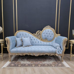 Vintage Chaise Lounge in Aged Wood Finish with Luxurious Sky Blue Velvet Upholstery