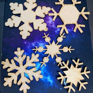 Set of 5 wooden snowflakes