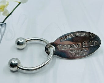 Authentic TIFFANY&Co. Oval T H E Monogram Tag  Key Ring in Silver.