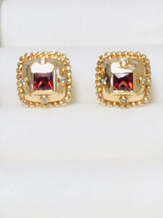JJM 14K Gold  Garnet Diamond earrings .