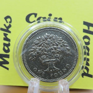 イギリスの硬貨1ポンドと20ぺんす イギリスの硬貨1ポンドと20ぺんす イギリスの硬貨1ポンドと20