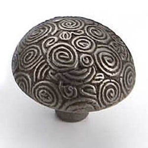 May include: A silver-toned metal cabinet knob with a swirling pattern.