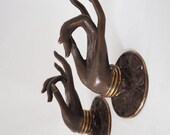 Bronze Buddha Hands Balinese Wall Hanging Statues Handcrafted Sculptures in Pair Handmade Artifacts Jewelry Display holder Bali Indonesia