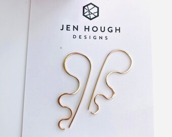 Voyager, a curved pull through earring