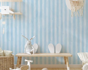 May include: A light blue striped wallpaper with a white wooden bench, a stuffed bunny rabbit, a toy airplane, and a basketball hoop.