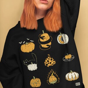 9 calabazas Halloween Spooky Fall Vintage Sudadera