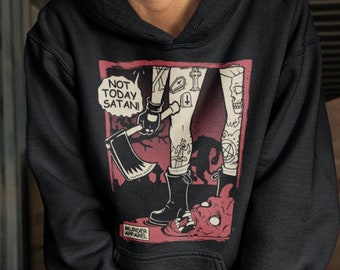 Könnte beinhalten: Schwarzer Hoodie mit einem Grafikdruck einer Person mit einer Axt, die auf einem roten Dämon steht. Die Grafik lautet "Not Today Satan!" und "Murder Apparel".