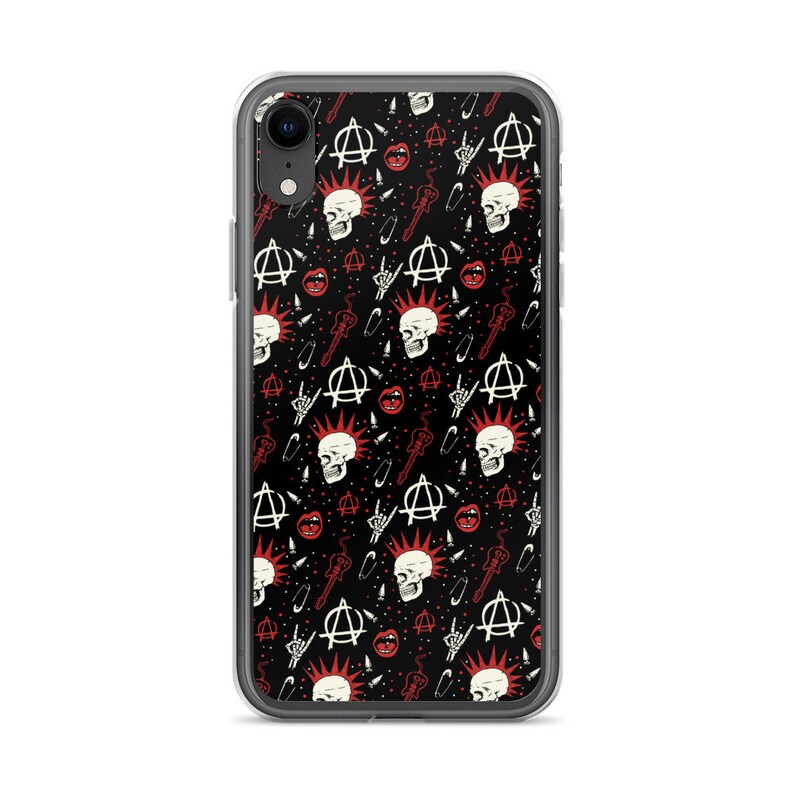 May include: A clear phone case with a black background and a repeating pattern of white anarchy symbols, red lips, guitar picks, safety pins, and white skulls with red mohawks.
