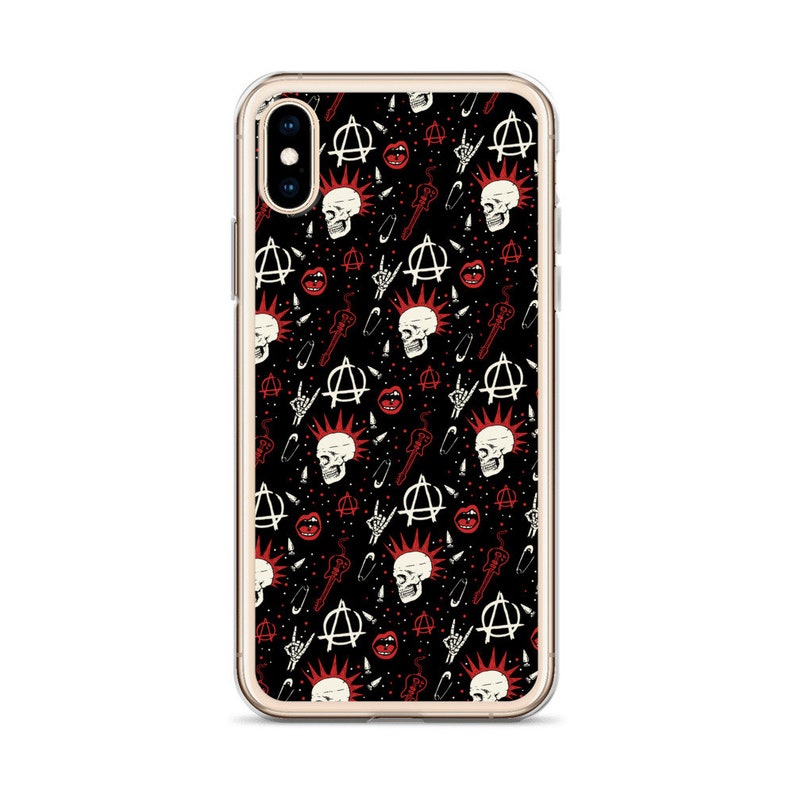 May include: A clear phone case with a black background and a pattern of white skulls, red lips, anarchy symbols, safety pins, and guitars.