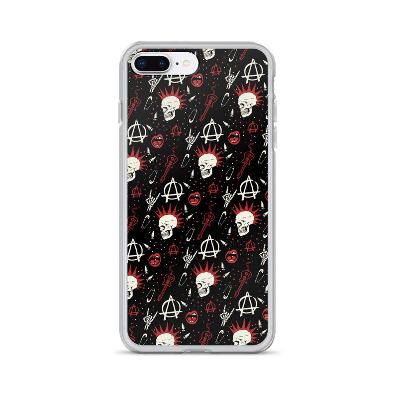 May include: A clear phone case with a black background and a repeating pattern of red and white punk rock symbols, including skulls, anarchy symbols, safety pins, and guitars.