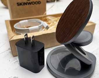 May include: A wireless charging stand with a wood-look finish and a magnetic phone holder. The stand has a gray base and a black charging pad. The stand is packaged with a black charging adapter and a white charging cable. The box is labeled "SKINWOOD".