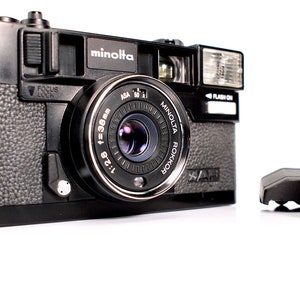 Serviced Minolta Hi-Matic AF 35mm Film Camera 38mm f2.8 Lens + Neck Strap + Lens Cap + Minolta Leather Case + Batteries - Film Tested