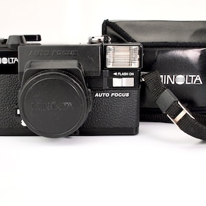 Minolta Hi-Matic AF2 35mm Film Camera + Minolta 38mm f2.8 Lens + Neck Strap + Minolta Leather Case + Batteries - Film Tested - Excellent