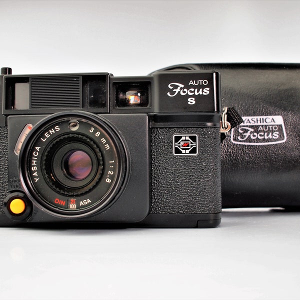 Mint Yashica Auto Focus S Premium Auto Focus 35mm Film Camera with Fast 38mm f2.8 lens + Leather Case + Neck Strap + Batteries