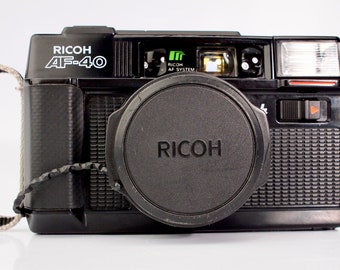 Near Mint Ricoh AF-40 Autofocus  35mm Point & Shoot  Film Camera - Fast Rikenon 38mm f2.8ens + Lens Cap with Keeper + Batteries  Film Tested