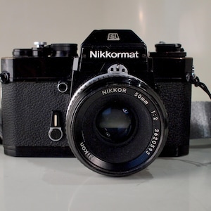 Black Nikon EL 35mm SLR Film Camera + Nikon 50mm f2 Lens + New Quick Release Strap Battery -  Film Tested - Underdog Nikon! Free Shipping