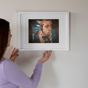 May include: A framed illustration of a man on the phone with a distressed expression. The illustration is in a comic book style with a vintage colour palette.