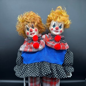 Porcelain face clown dolls deals
