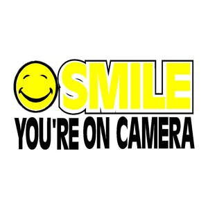 May include: Yellow smiley face with the word "SMILE" in yellow letters with a black outline and the text "YOU'RE ON CAMERA" in black letters.