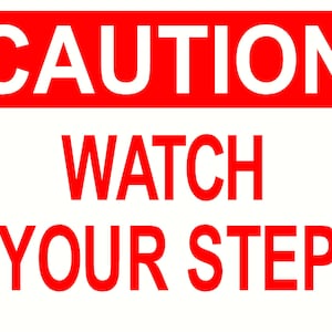 May include: Red and white caution sign with the text "CAUTION" in a white rectangle and the text "WATCH YOUR STEP" in red letters.