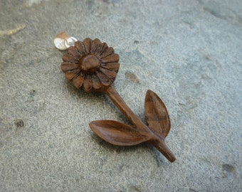 Carved Flower Pendant, walnut silver