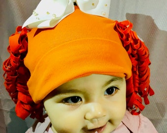 Beautiful beanie that gives your baby hair!