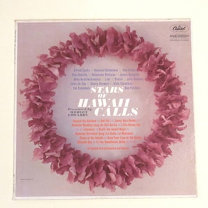 May include: A vintage vinyl record album cover featuring a pink lei with the title "Stars of Hawaii Calls" and the text "Presented by Webley Edwards". The album cover features a list of artists and song titles.