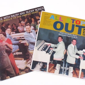 May include: Two vintage vinyl record covers featuring Ralph and Buddy Bonds playing Hammond organs. The first cover is titled "Open House with Ralph and Buddy Bonds" and shows the duo performing in front of a crowd. The second cover is titled "All Stops Out" and shows the duo playing Hammond organs in a studio setting.