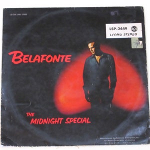 May include: A black and white vinyl record cover with a red background. The cover features a photo of Harry Belafonte, a singer and actor, and the text "Belafonte The Midnight Special LSP-2449 RCA Living Stereo".