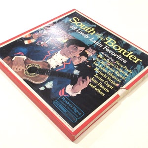 May include: A red box with the title "South of the Border 48 Lively Latin Favorites" featuring a man playing a guitar. The box features a list of artists including Perez Prado, Mariachi los Camperos, Los Hermanos Rigual, Los Indios Tabajaras, Mariachi Vargas, Xavier Cugat, João Donato, and others.