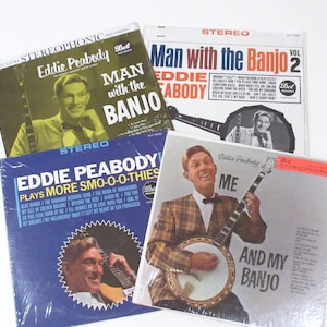 May include: Four vintage vinyl records by Eddie Peabody, a banjo player. The records are titled "Man with the Banjo", "Man with the Banjo Vol. 2", "Plays More Smo-o-o-thies", and "Me and My Banjo".
