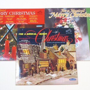 May include: Three vintage vinyl records with a Christmas theme. The records are titled "For a Musical Merry Christmas" and feature a snowy winter scene with a village and a Christmas tree. The records are in a collector's limited edition.