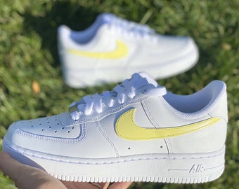 yellow swoosh af1