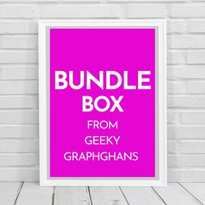 May include: A framed print with a vivid pink background and white text that reads "BUNDLE BOX FROM GEEKY GRAPHGHANS." The frame is white, and the background is a bright pink. The print is displayed against a white brick wall and a white wooden surface.