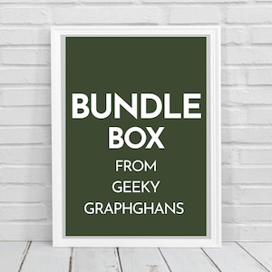 May include: A framed print with a dark green background and white text that reads "BUNDLE BOX FROM GEEKY GRAPHGHANS." The frame is white, and the background is a brick wall.