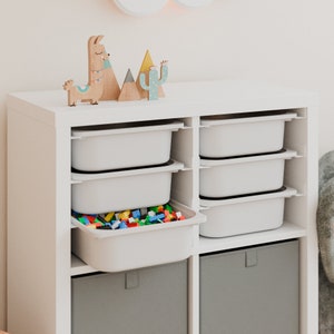 Ikea Kallax inserisce il sistema di binari Schuuver con scatole Trofast in diversi colori ideali per riporre i giocattoli immagine 2