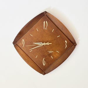 MCM Wood Cardinal Wall Clock - Atomic Era Geometric Sculpted Wooden Face - Mid-century Modern Home Decor Accent